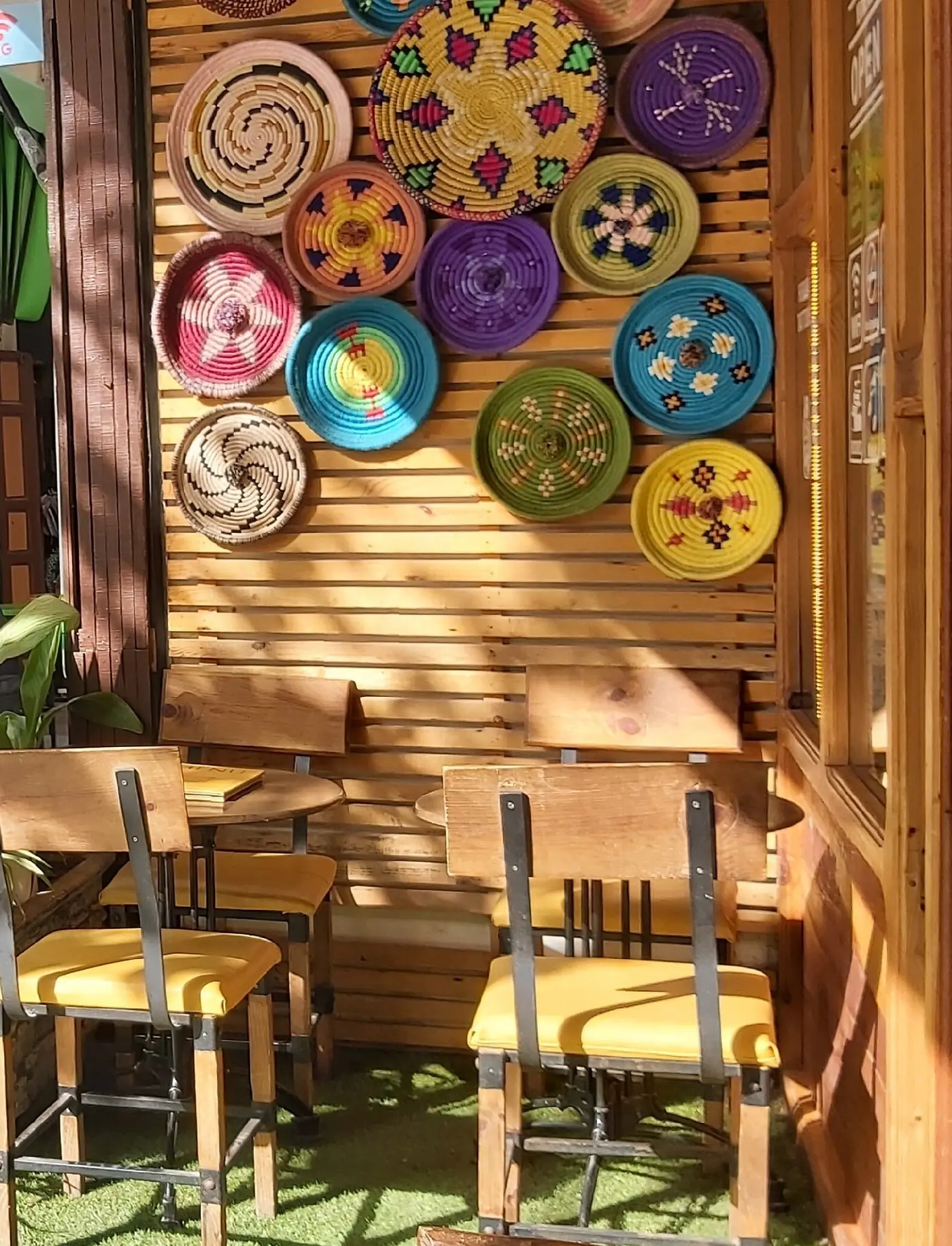 Wall of hand-woven Moroccan plates on the Culture Box terrace